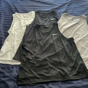 4 lot Nike Dri-Fit tank tops
